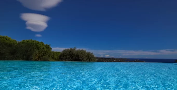 Very blue sea with land in the background